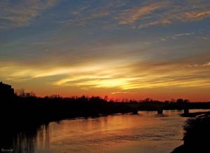 Tramonto sul fiume (di Paola Cariati)